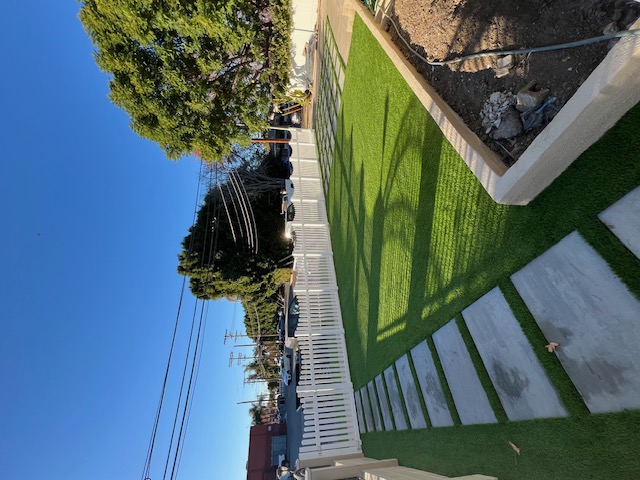 Travertine pool deck by Pave It Landscape LLC