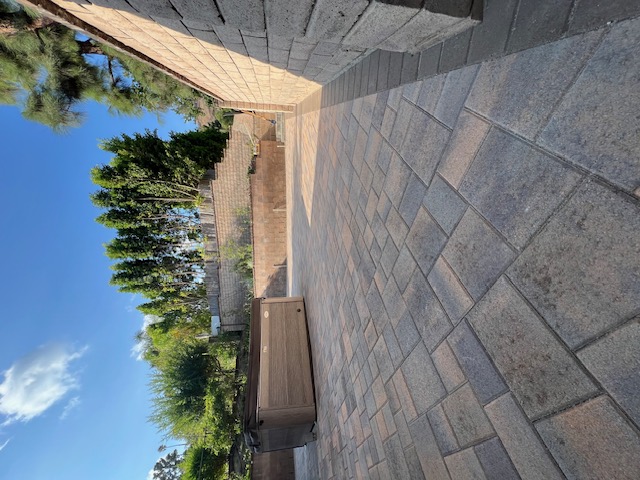 Outdoor kitchen paver area by Pave It Landscape LLC