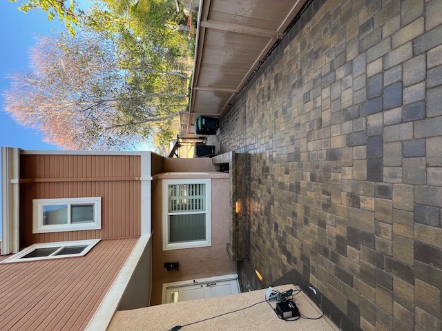 Backyard entertainment area by Pave It Landscape LLC