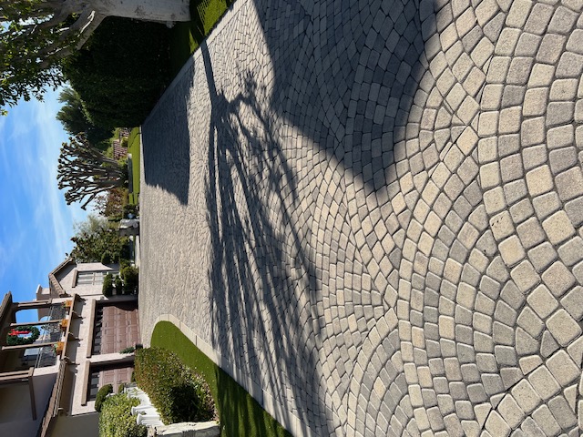 Paver driveway installation by Pave It Landscape LLC
