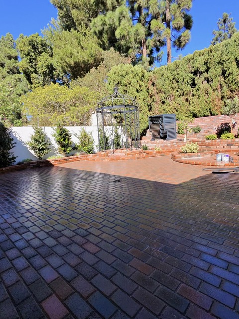 Natural travertine patio by Pave It Landscape LLC