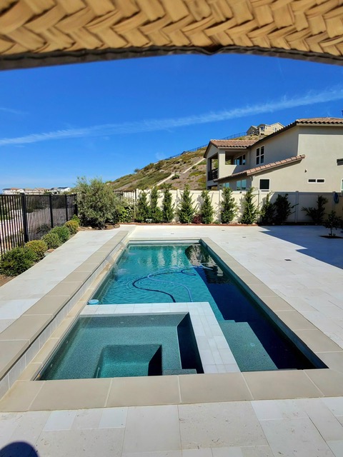Paver patio and pool combo by Pave It Landscape LLC